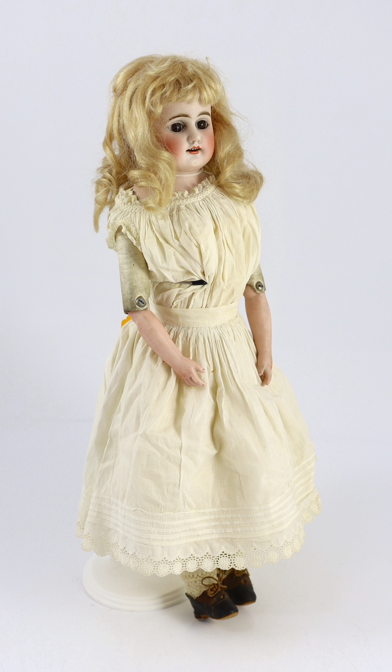 An Armand Marseille shoulder-bisque doll, German, circa 1896, 18in.